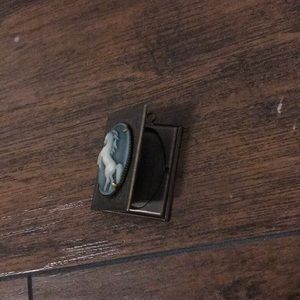 A pocket that you can attach to your jewelry.